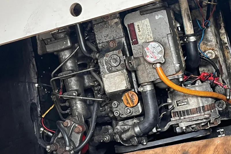 Nikita 1 Yacht Photos Pics Engine compartment of a 2004 Fountaine Pajot Bahia 46 catamaran, showing mechanical components.