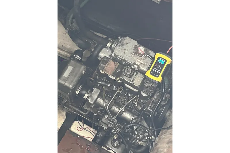 Nikita 1 Yacht Photos Pics Engine of 2004 Fountaine Pajot Bahia 46 catamaran with diagnostic tool attached.