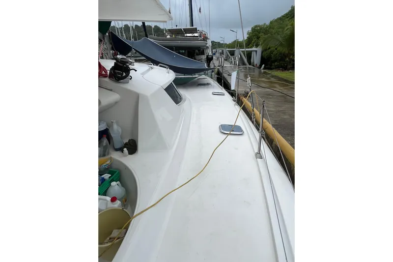 Nikita 1 Yacht Photos Pics 2004 Fountaine Pajot Bahia 46 catamaran docked, showing deck and equipment.