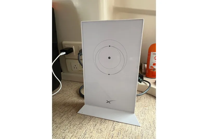 Nikita 1 Yacht Photos Pics Starlink satellite dish inside a 2004 Fountaine Pajot Bahia 46 catamaran.