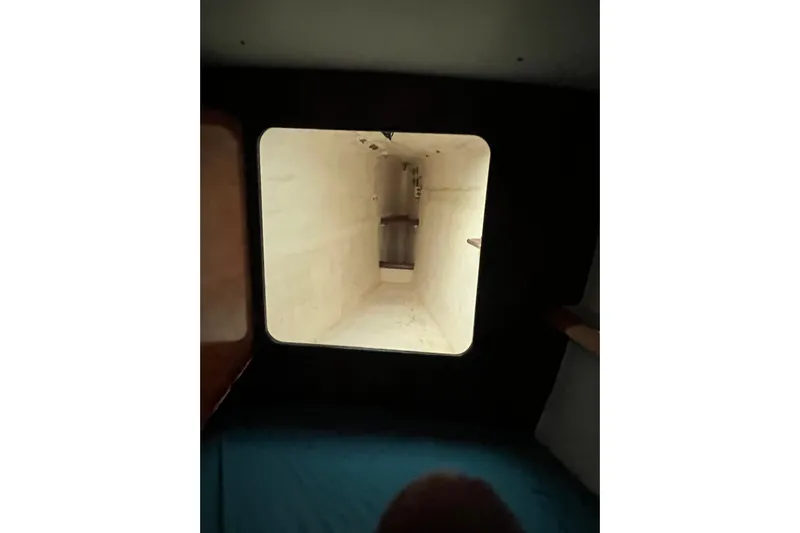 Nikita 1 Yacht Photos Pics Interior view of 2004 Fountaine Pajot Bahia 46 catamaran, showcasing a narrow passageway.