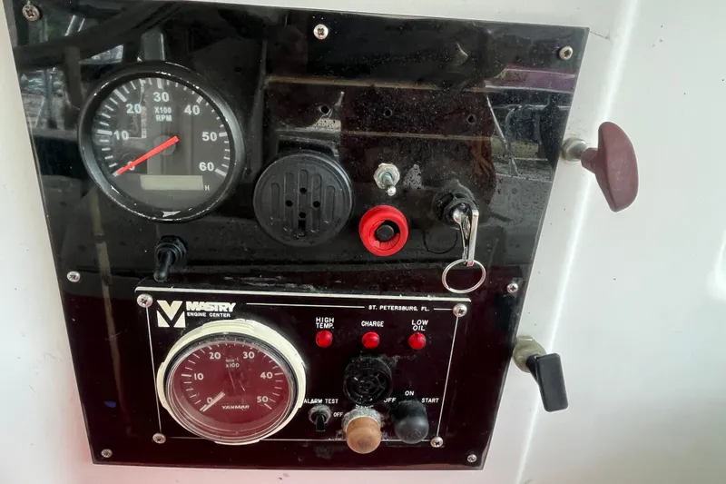 Nikita 1 Yacht Photos Pics Control panel of a 2004 Fountaine Pajot Bahia 46 catamaran with gauges and switches.