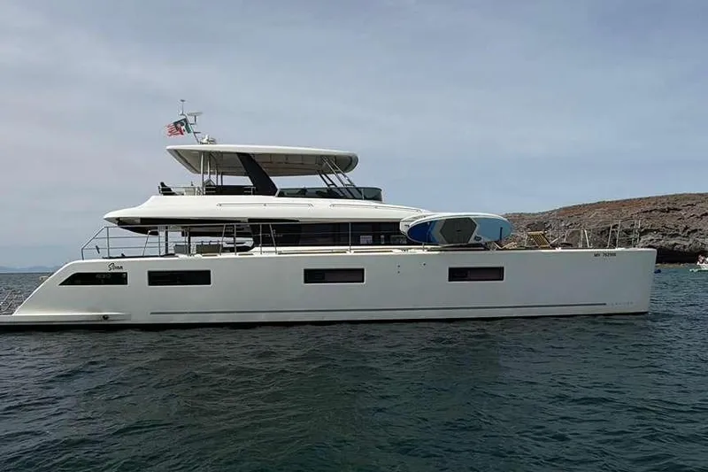 Sona 1 Yacht Photos Pics 2019 Lagoon 630 MY yacht on calm waters, side view.