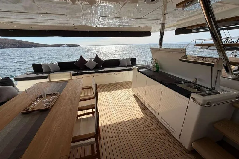Sona 1 Yacht Photos Pics Luxurious 2019 Lagoon 630 MY yacht interior with elegant seating and ocean view.