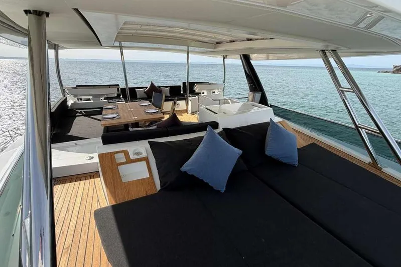 Sona 1 Yacht Photos Pics Luxurious 2019 Lagoon 630 MY yacht interior with elegant seating and ocean view.