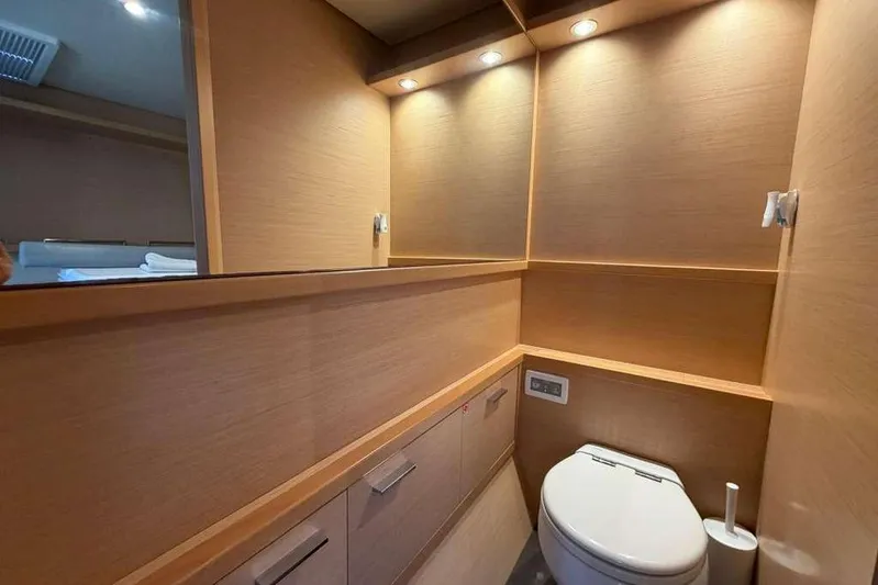 Sona 1 Yacht Photos Pics Luxurious bathroom interior of 2019 Lagoon 630 MY yacht with modern fixtures.