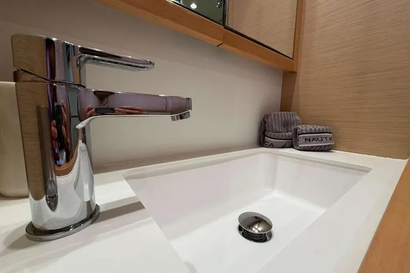 Sona 1 Yacht Photos Pics Modern bathroom sink with chrome faucet on 2019 Lagoon 630 MY yacht.