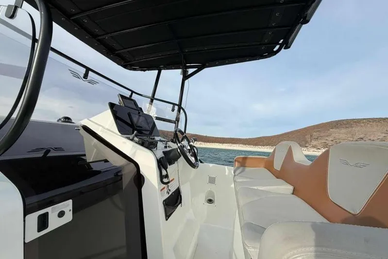 Sona 1 Yacht Photos Pics Interior view of 2019 Lagoon 630 MY yacht with modern helm and seating.