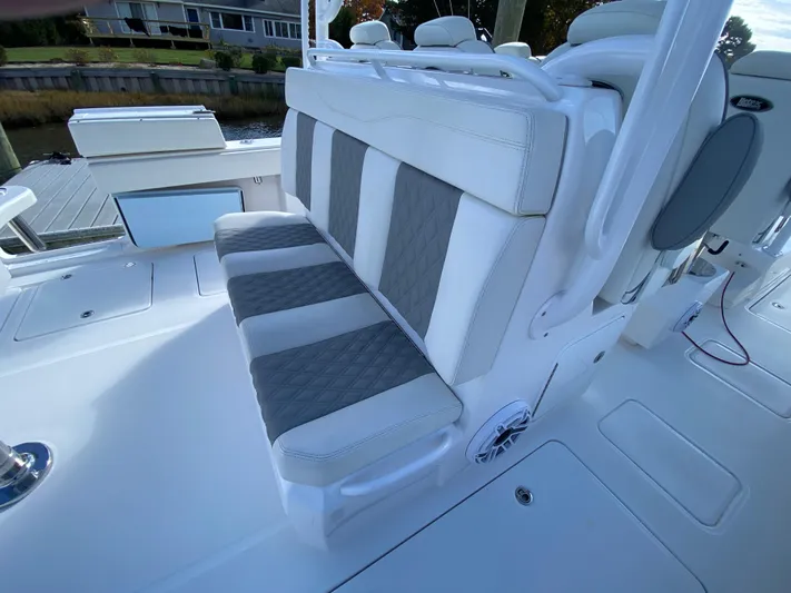  Yacht Photos Pics 2023 Invincible 46 Catamaran Plus Quad Axle Trailer, featuring stylish seating.