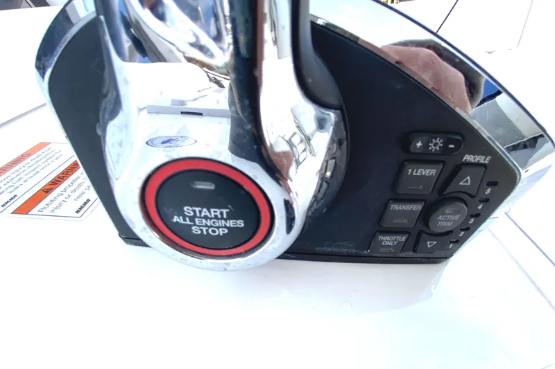  Yacht Photos Pics Control panel of 2023 Invincible 46 Catamaran Plus, featuring engine start-stop button.