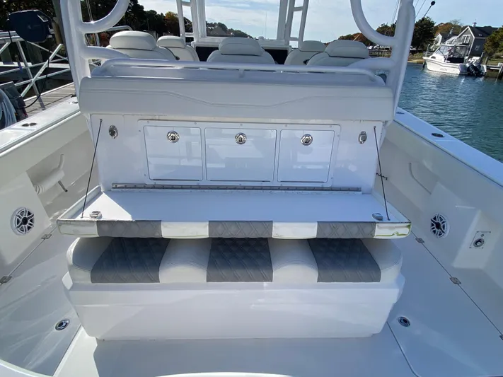  Yacht Photos Pics 2023 Invincible 46 Catamaran Plus Quad Axle Trailer, featuring spacious seating and storage compartments.