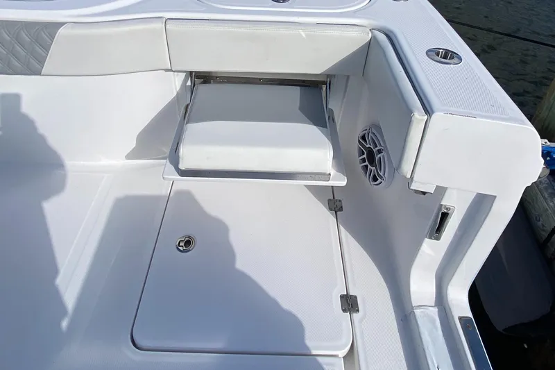  Yacht Photos Pics 2023 Invincible 46 Catamaran Plus Quad Axle Trailer, featuring sleek white deck design.