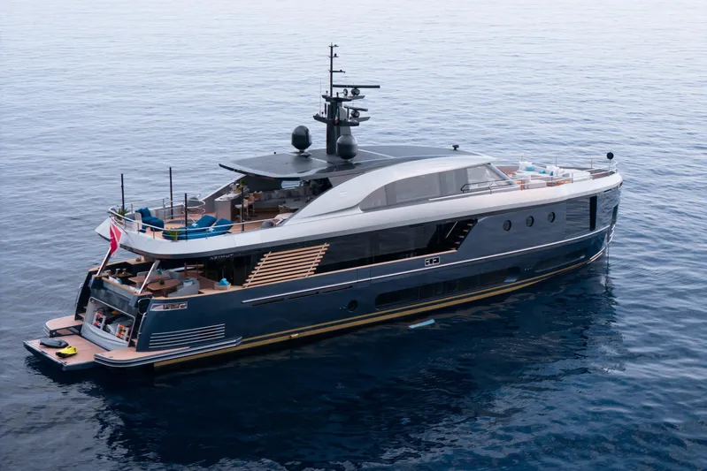 Palmax Yacht Photos Pics Luxurious 2022 Azimut Magellano 30M yacht cruising on calm blue waters.