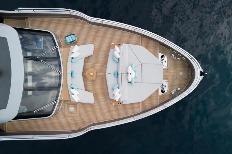 Palmax Yacht Photos Pics Aerial view of 2022 Azimut Magellano 30M yacht deck with elegant seating and cushions.