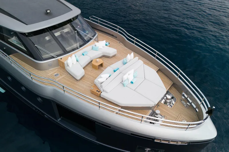 Palmax Yacht Photos Pics Luxurious 2022 Azimut Magellano 30M yacht with elegant deck seating and ocean view.