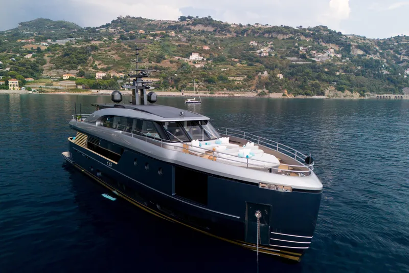 Palmax Yacht Photos Pics Luxurious 2022 Azimut Magellano 30M yacht on serene coastal waters.