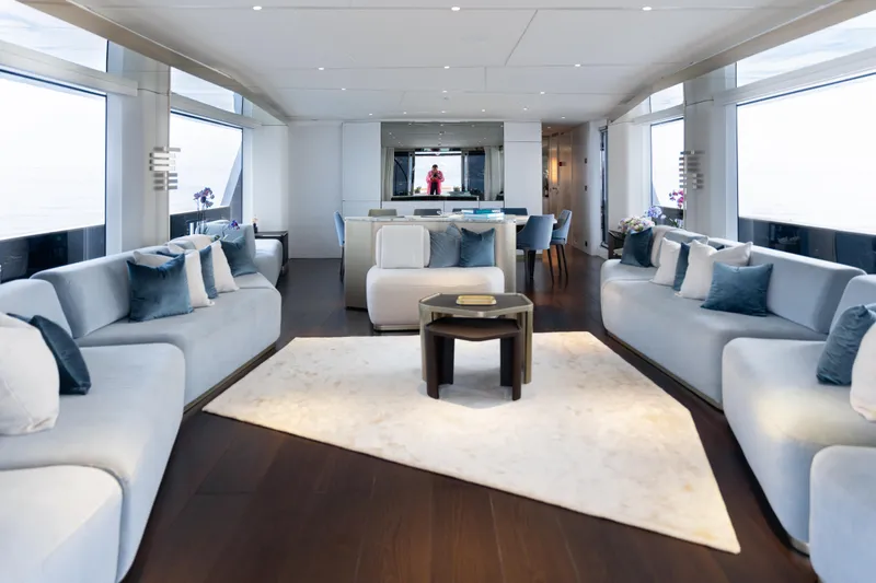 Palmax Yacht Photos Pics Luxurious interior of 2022 Azimut Magellano 30M yacht with elegant seating and modern decor.