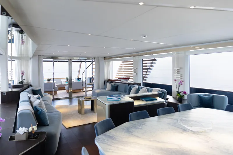 Palmax Yacht Photos Pics Luxurious interior of 2022 Azimut Magellano 30M yacht with elegant seating and ocean views.