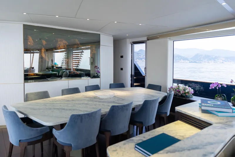 Palmax Yacht Photos Pics Luxurious dining area on 2022 Azimut Magellano 30M yacht with sea view.