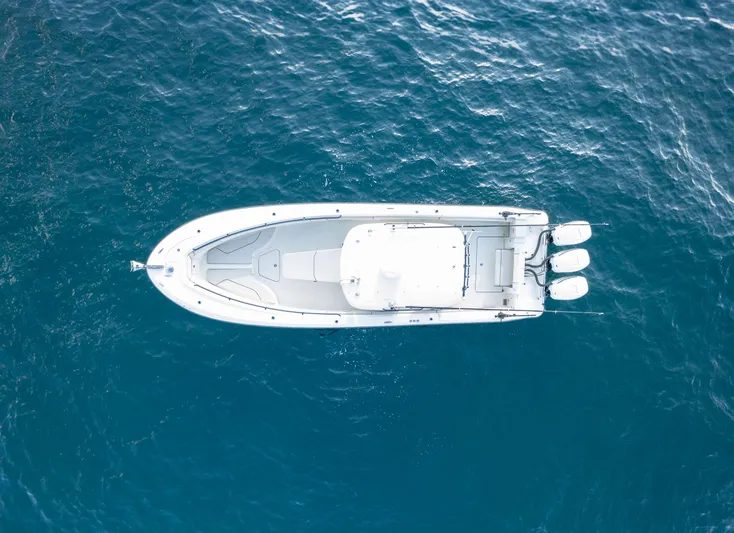  Yacht Photos Pics Aerial view of 2022 Hydra-Sports 3400 boat on blue ocean water.