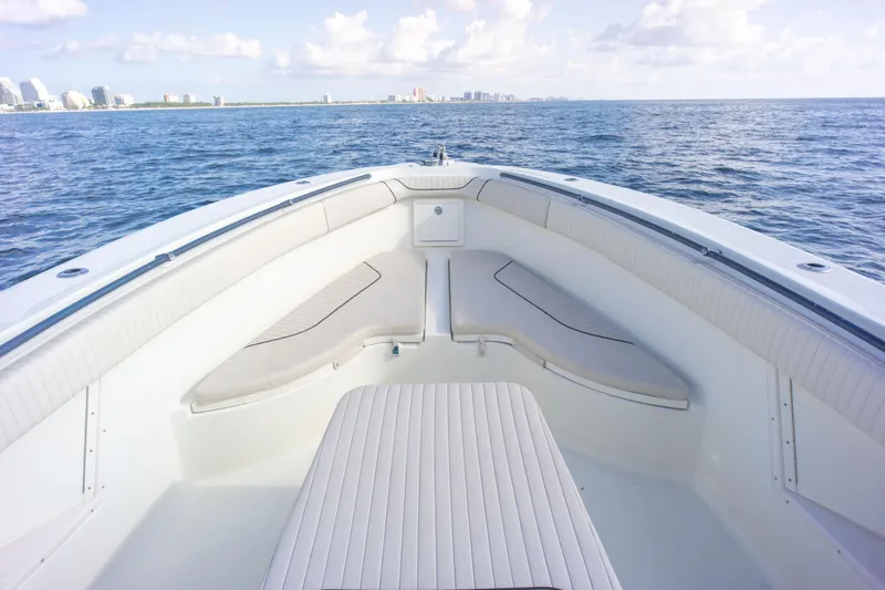  Yacht Photos Pics 2022 Hydra-Sports 3400 boat interior with ocean view and city skyline in the background.