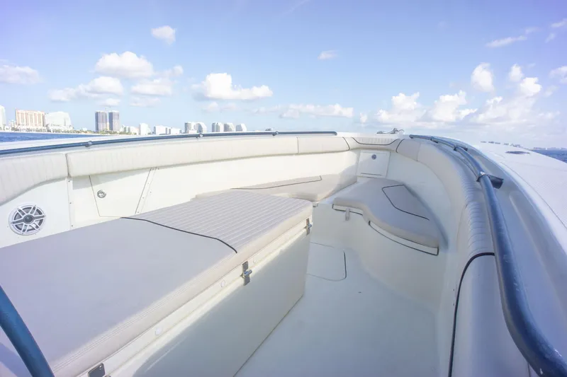  Yacht Photos Pics 2022 Hydra-Sports 3400 boat interior with seating, under a clear blue sky.