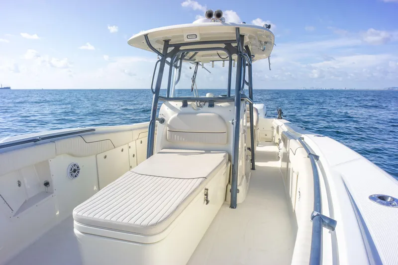  Yacht Photos Pics 2022 Hydra-Sports 3400 boat on open water, featuring spacious deck and modern design.