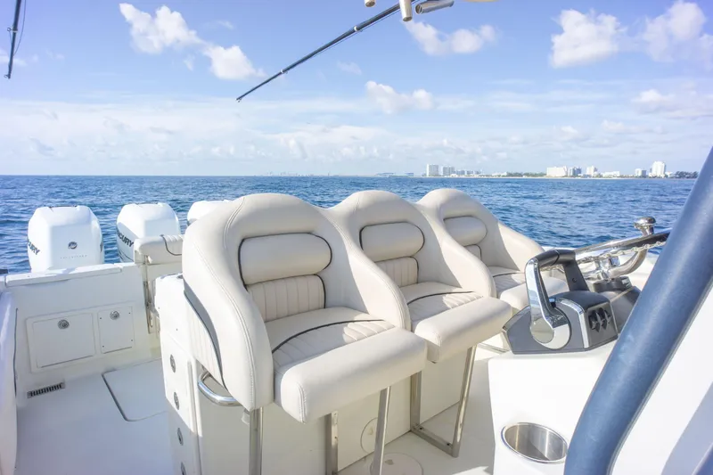  Yacht Photos Pics 2022 Hydra-Sports 3400 boat interior with plush seating, ocean view, and modern controls.