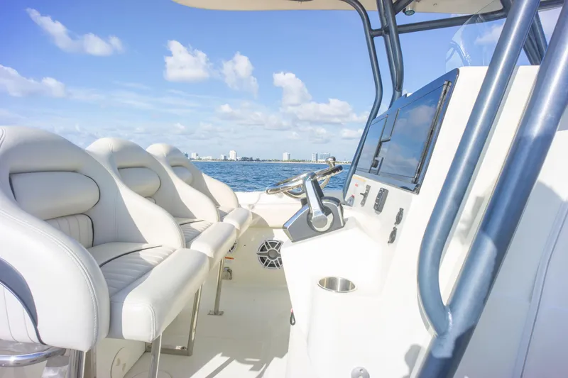  Yacht Photos Pics 2022 Hydra-Sports 3400 boat interior with luxurious seating and ocean view.
