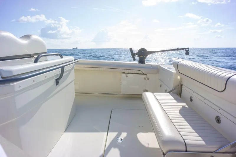  Yacht Photos Pics 2022 Hydra-Sports 3400 boat interior with ocean view, featuring white seating and clear skies.