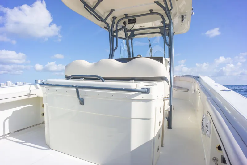  Yacht Photos Pics 2022 Hydra-Sports 3400 boat deck with seating, under a clear blue sky.