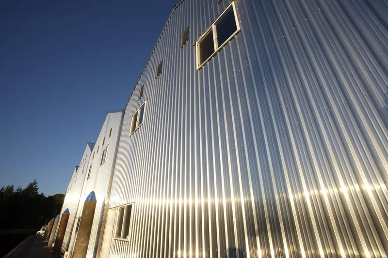  Yacht Photos Pics Modern corrugated metal boathouse reflecting sunlight, Custom OBMG model, 2025 design.