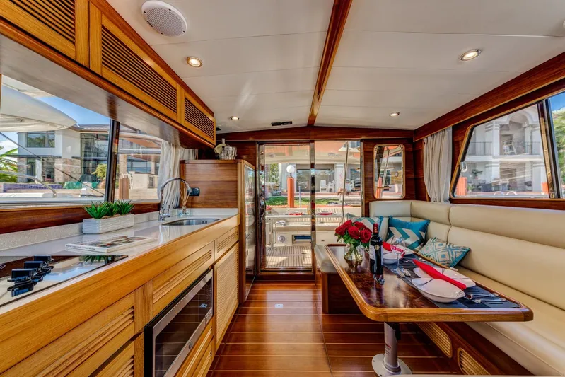  Yacht Photos Pics Luxurious interior of 2025 Norseman 45 FreeOcean yacht with elegant wood finishes.