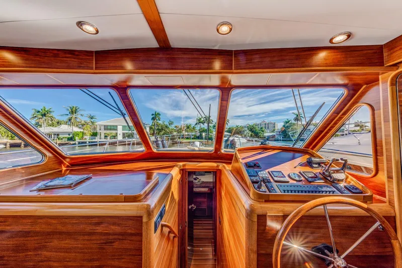  Yacht Photos Pics Luxurious Norseman 45 FreeOcean 2025 yacht interior with wooden finish and panoramic windows.
