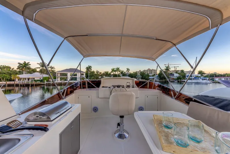  Yacht Photos Pics Luxury Norseman 45 FreeOcean yacht interior, 2025 model, featuring elegant seating and scenic marina view.