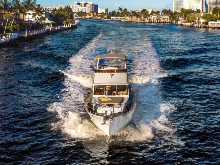  Yacht Photos Pics Norseman 45 FreeOcean 2025 yacht cruising through a scenic waterway.