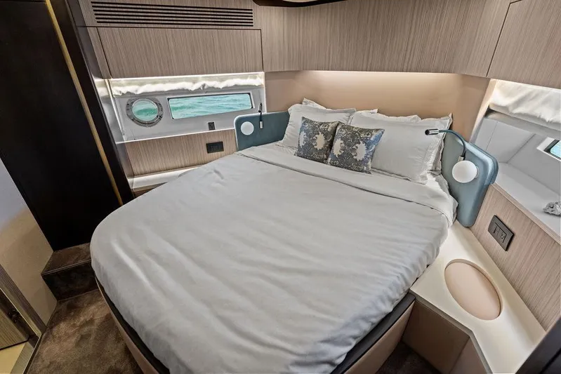 Mi Boat Yacht Photos Pics Luxurious 2019 Azimut yacht bedroom with elegant bedding and ocean view.