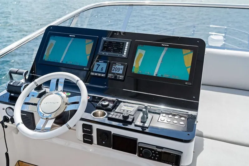Mi Boat Yacht Photos Pics 2019 Azimut yacht helm with dual navigation screens and steering wheel.