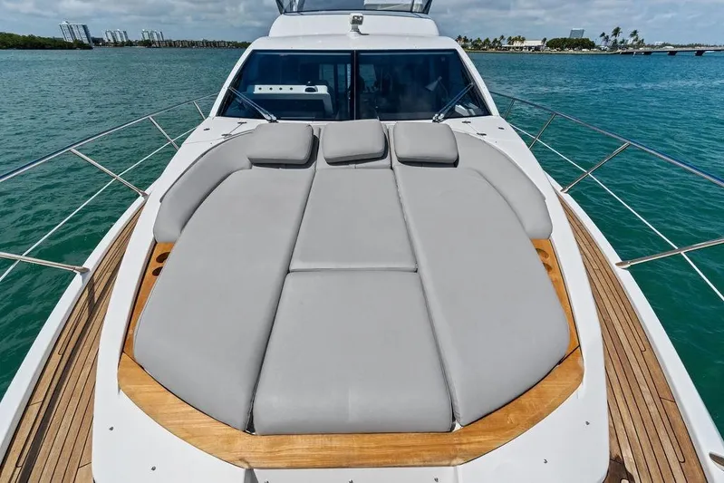 Mi Boat Yacht Photos Pics Luxurious 2019 Azimut yacht with spacious sunbathing deck on calm waters.
