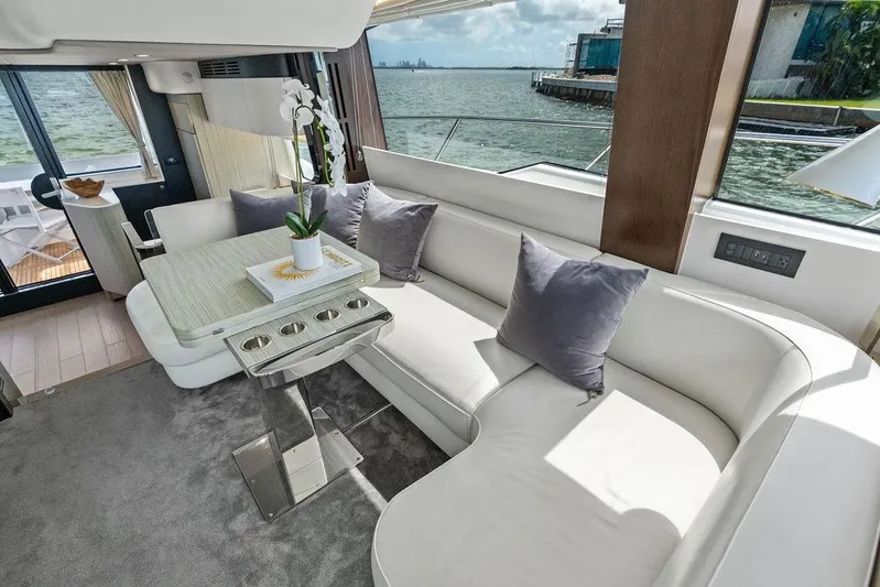 Mi Boat Yacht Photos Pics Luxurious 2019 Azimut yacht interior with elegant seating and scenic ocean view.