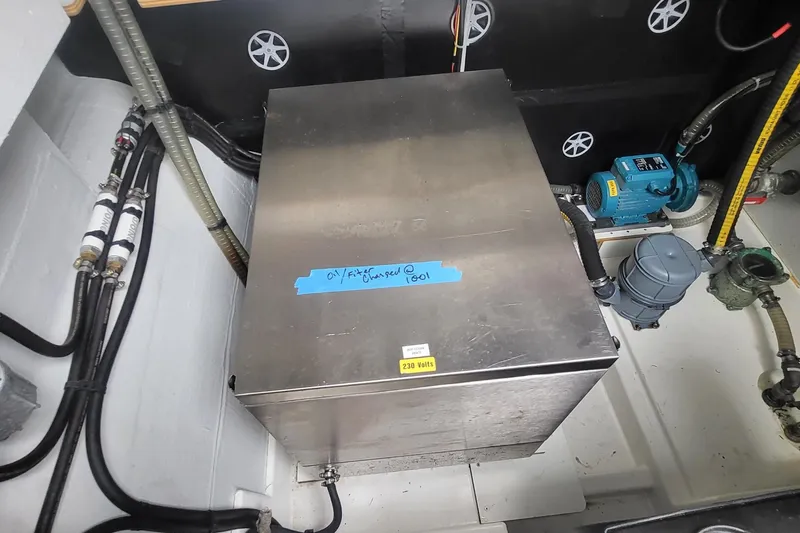  Yacht Photos Pics Engine room of 2024 Fountaine Pajot MY6 yacht with equipment and wiring.