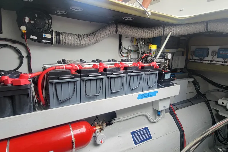  Yacht Photos Pics Engine room of 2024 Fountaine Pajot MY6 yacht with batteries and equipment.