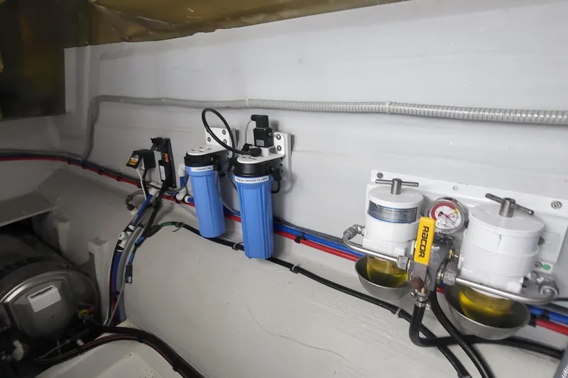  Yacht Photos Pics Engine room of 2024 Fountaine Pajot MY6 with filtration system and wiring.