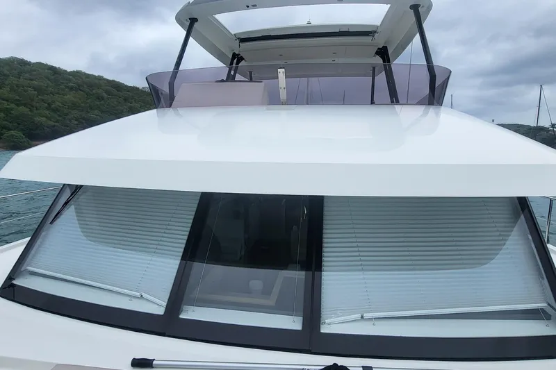  Yacht Photos Pics 2024 Fountaine Pajot MY6 yacht with sleek design and modern windows.
