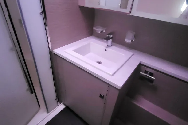  Yacht Photos Pics 2024 Fountaine Pajot MY6 bathroom with modern sink and sleek design.