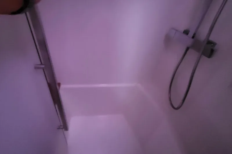  Yacht Photos Pics Shower area inside 2024 Fountaine Pajot MY6 yacht with modern fixtures.