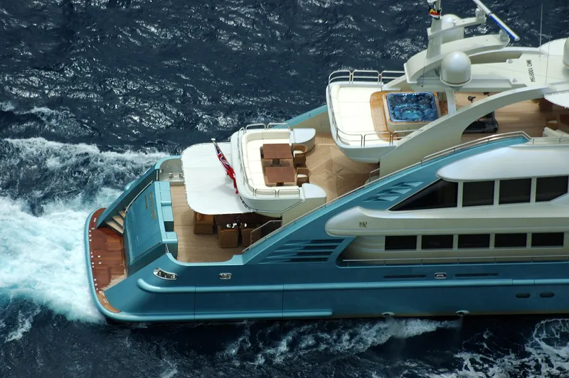 Aquamarina Yacht Photos Pics Luxury yacht ISA 470 cruising on the ocean, featuring a spacious deck and modern design.