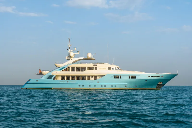 Aquamarina Yacht Photos Pics Luxury ISA 470 yacht from 2007 on calm blue sea under clear sky.