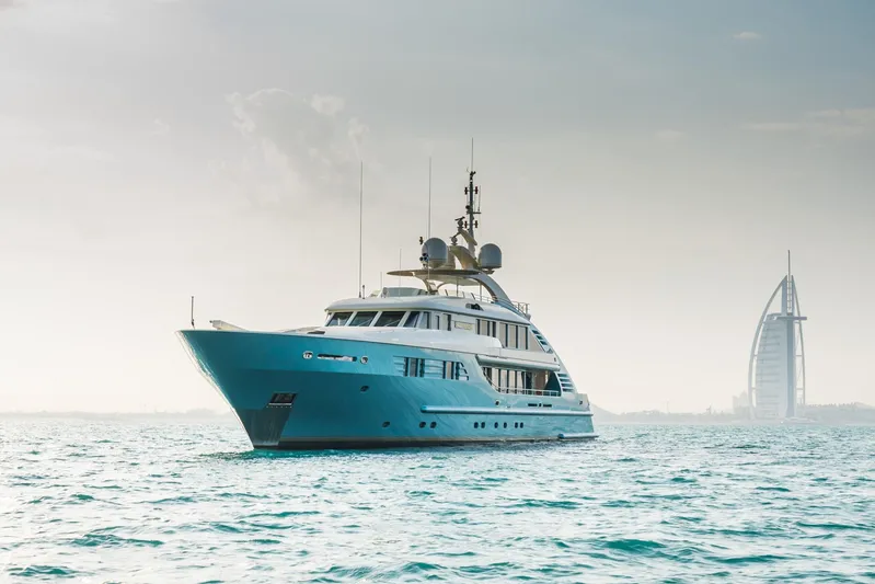 Aquamarina Yacht Photos Pics Luxury yacht ISA 470 cruising near iconic waterfront architecture.