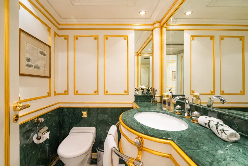 Aquamarina Yacht Photos Pics Luxurious yacht bathroom with green marble and gold accents, ISA 470, 2007 model.
